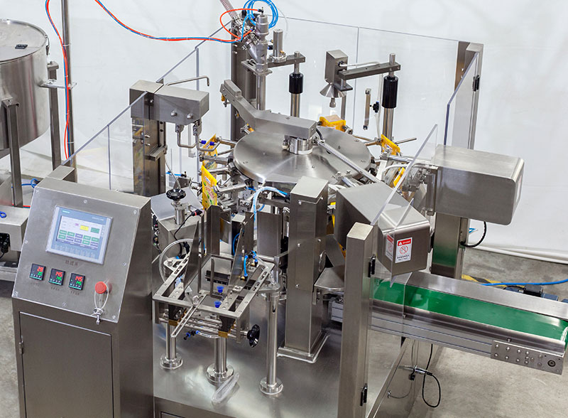 Automatic Rotary Ghee Premade Pouch Filling Sealing Machine