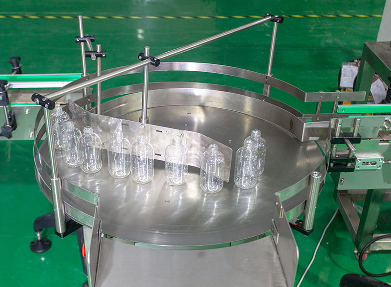 Full Automatic Alcohol Plastic Bottle Filling Capping Labeling Line With Bottle Unscrambler